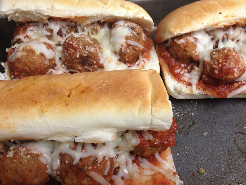 Freshly baked calzone or stromboli with golden crust from Holiday Pizza